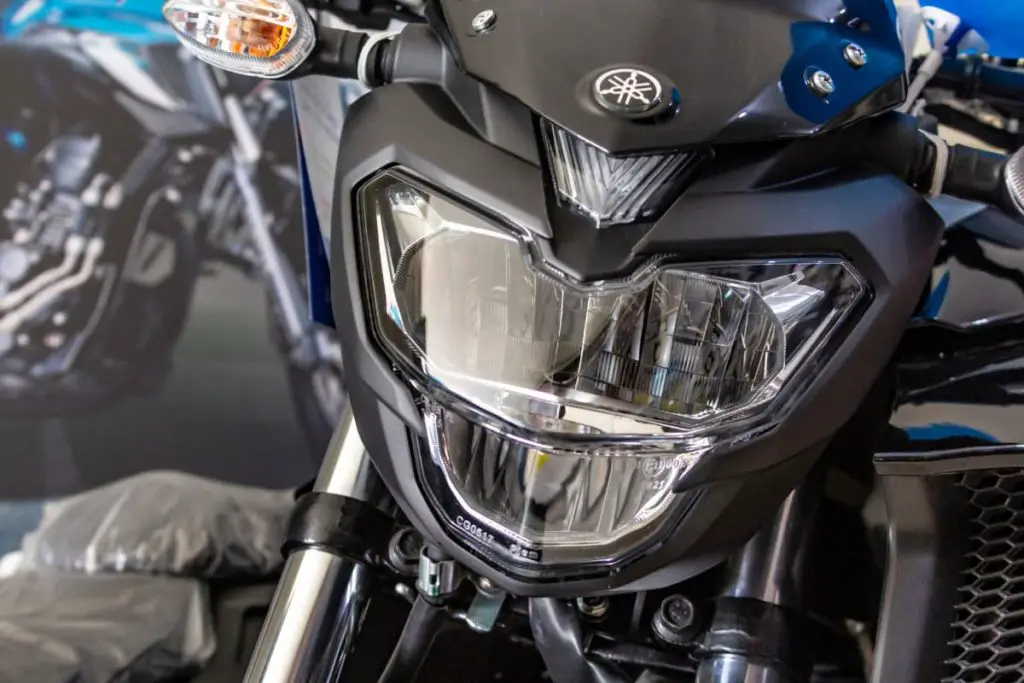 close up of headlight and handlebar of a Yamaha