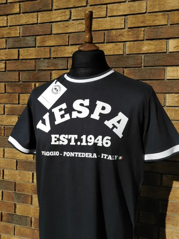 Gift idea for scooter rider showing a black shirt with Vespa established in 1946 text