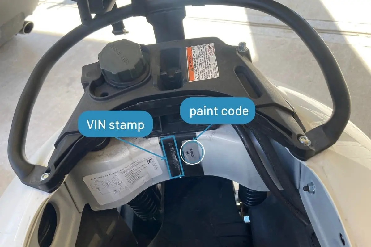 vin stamp and paint code circled on a Vespa GTS 300 for identification