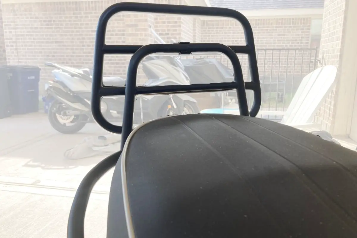 black rear rack folded up on a Vespa GTS