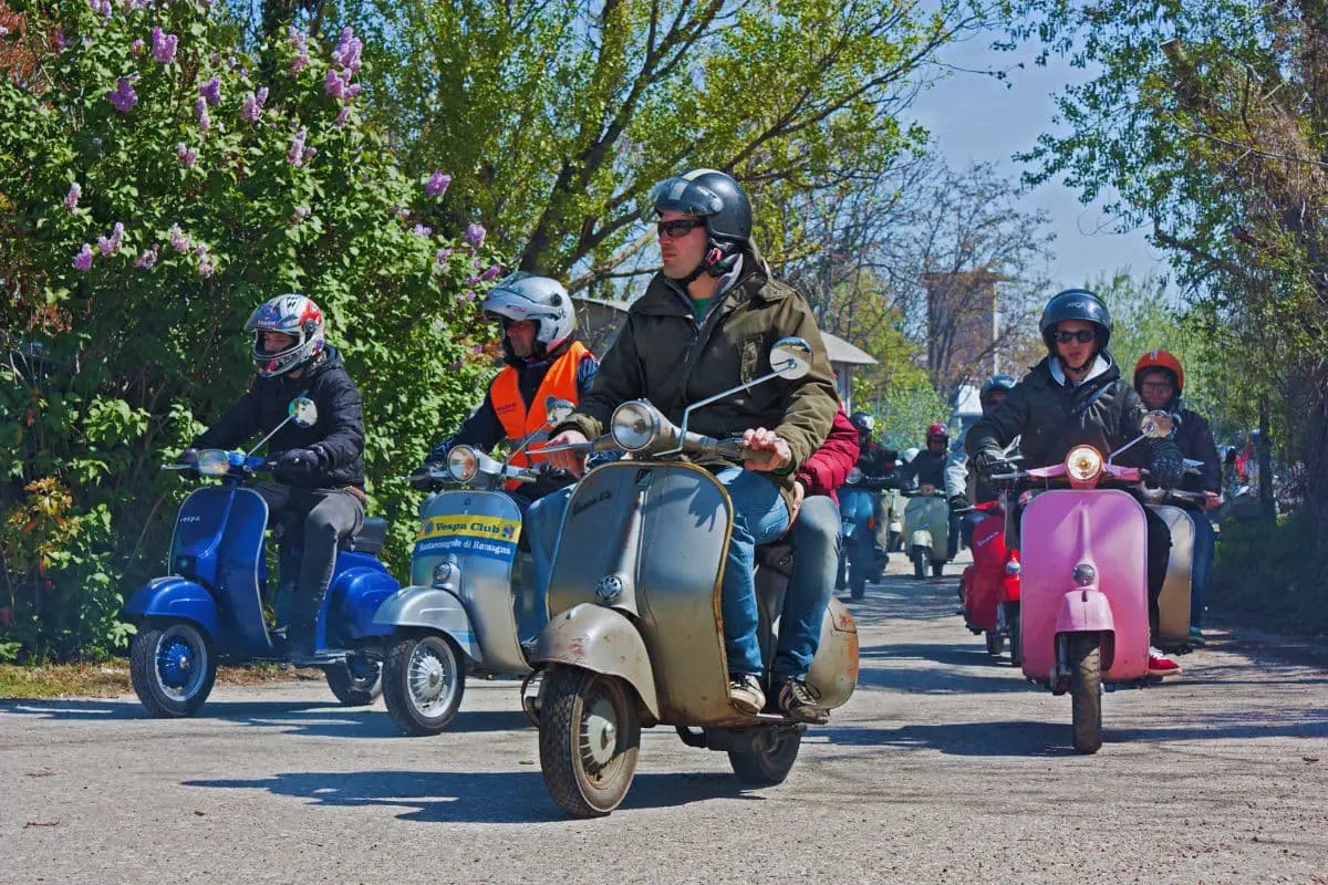 group of scooter riders at a rally